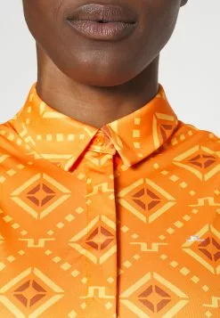 J.Lindeberg SportsDENA SLEEVELESS - Linne - Orange 9 J.Lindeberg SportsDENA SLEEVELESS - Linne - Orange -J.Lindeberg Affär 185efacafbb24e50a08685c2cdfa71a5