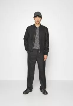 J.LINDEBERGHAIJ PANTS - Tygbyxor - Black 11 J.LINDEBERGHAIJ PANTS - Tygbyxor - Black -J.Lindeberg Affär 746bbc6c86f549179a194bc2754a70ab