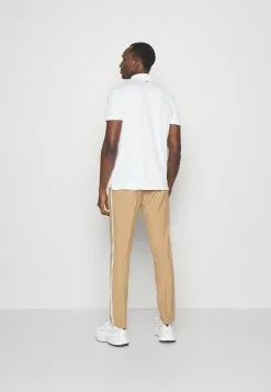 J.Lindeberg SportsSTUART PANT - Tygbyxor - Tiger Brown -J.Lindeberg Affär 7fb6af7151384c09ac0e4ebc6ed55de4