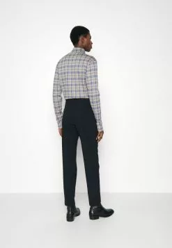 J.LINDEBERGTECH RIPSTOP PANTS - Tygbyxor - Black -J.Lindeberg Affär ad4cac78f544473a8707088ebccf881b