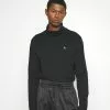 J.LINDEBERGAYDIN EMBROIDED TURTLE NECK - Pyjamasöverdel - Black